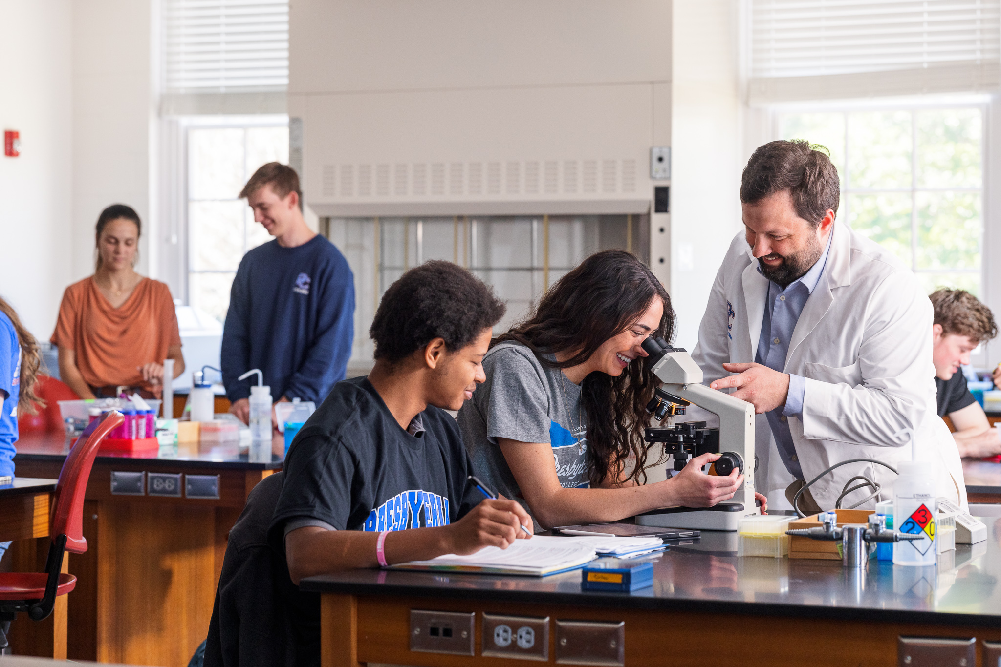 Presbyterian College students in a lab with Dr. Austin Shull.