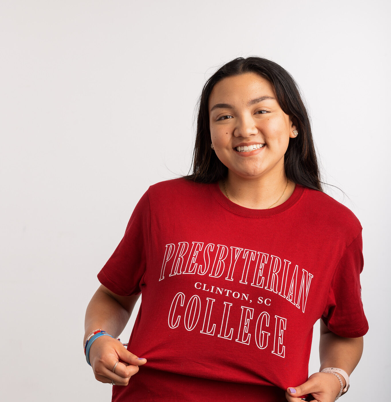 Presbyterian College student, Vanessa Palisin, posing with a PC t-shirt.
