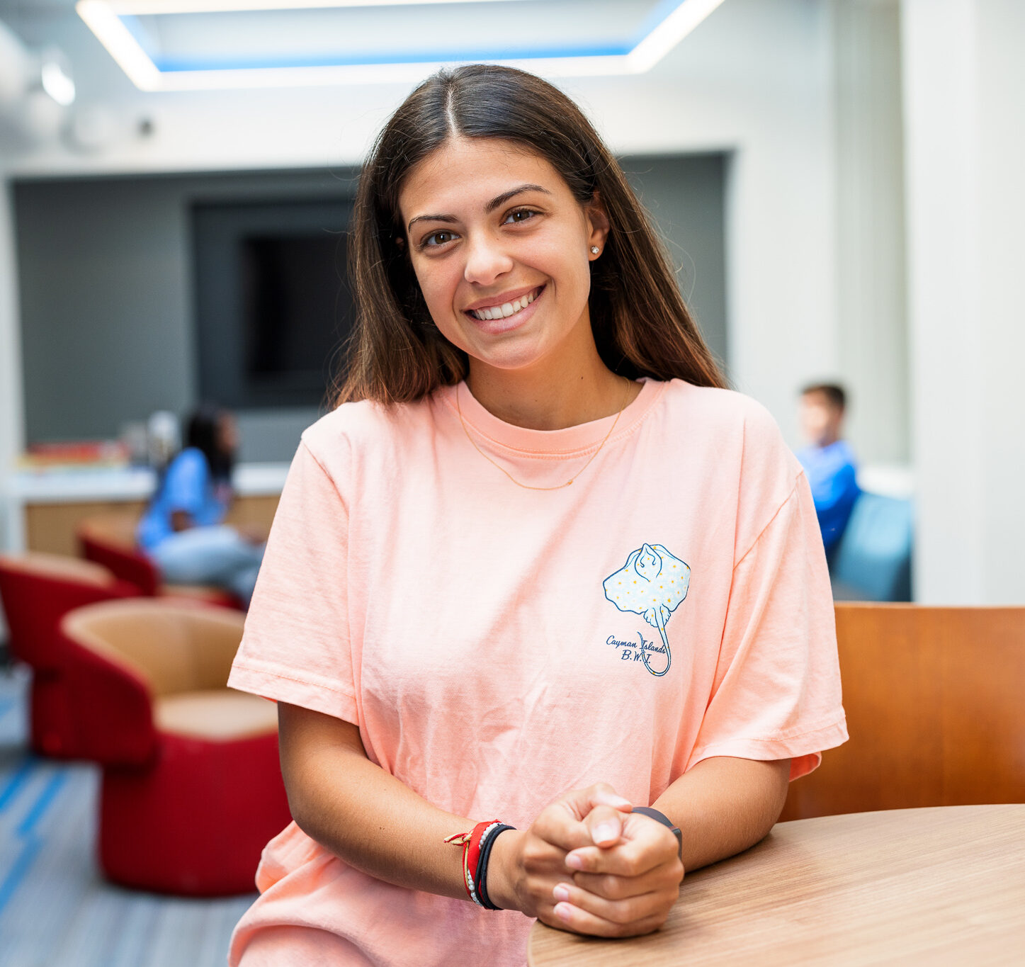 Presbyterian College student smiling at camera in Springs Student Center.