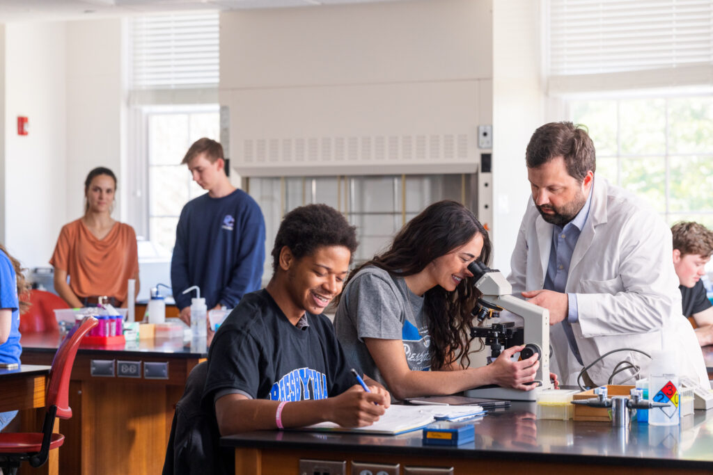 Presbyterian College students in a lab with Dr. Austin Shull.