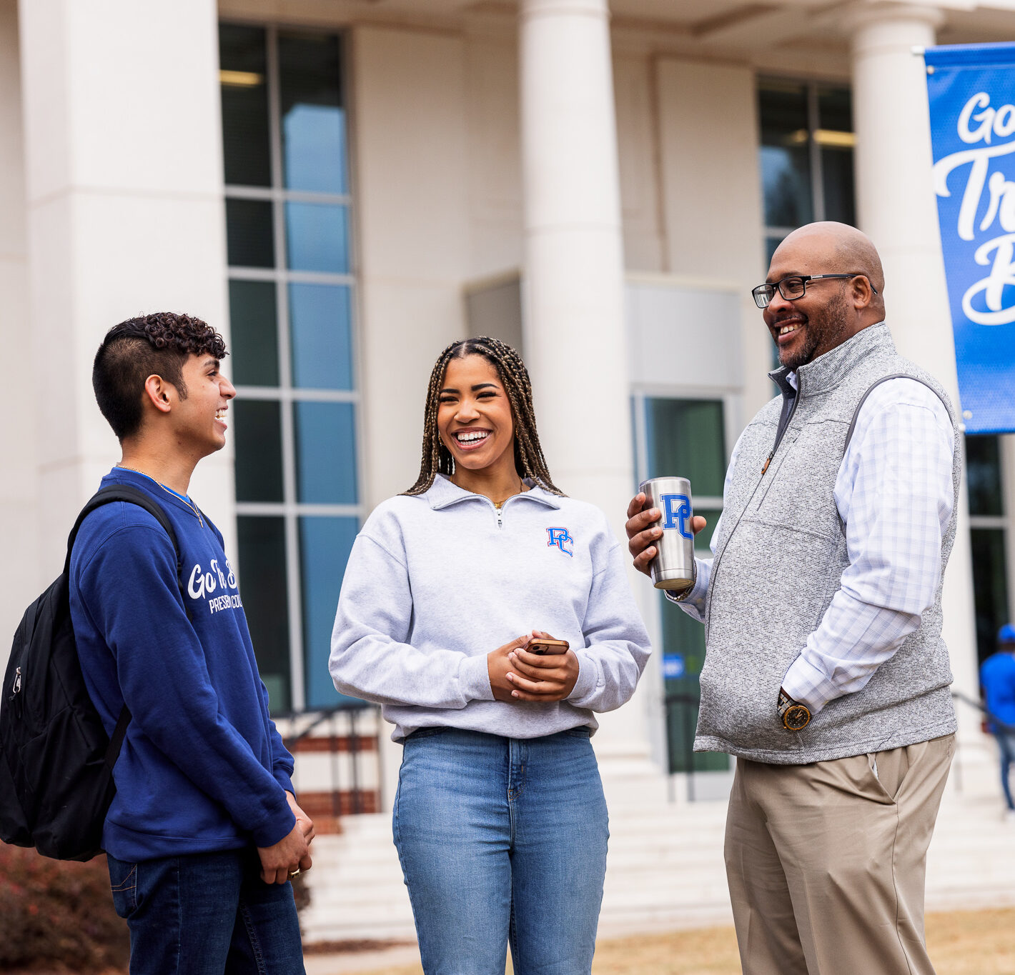 Presbyterian College students talking with Dr. Will Harris at Presbyterian College.