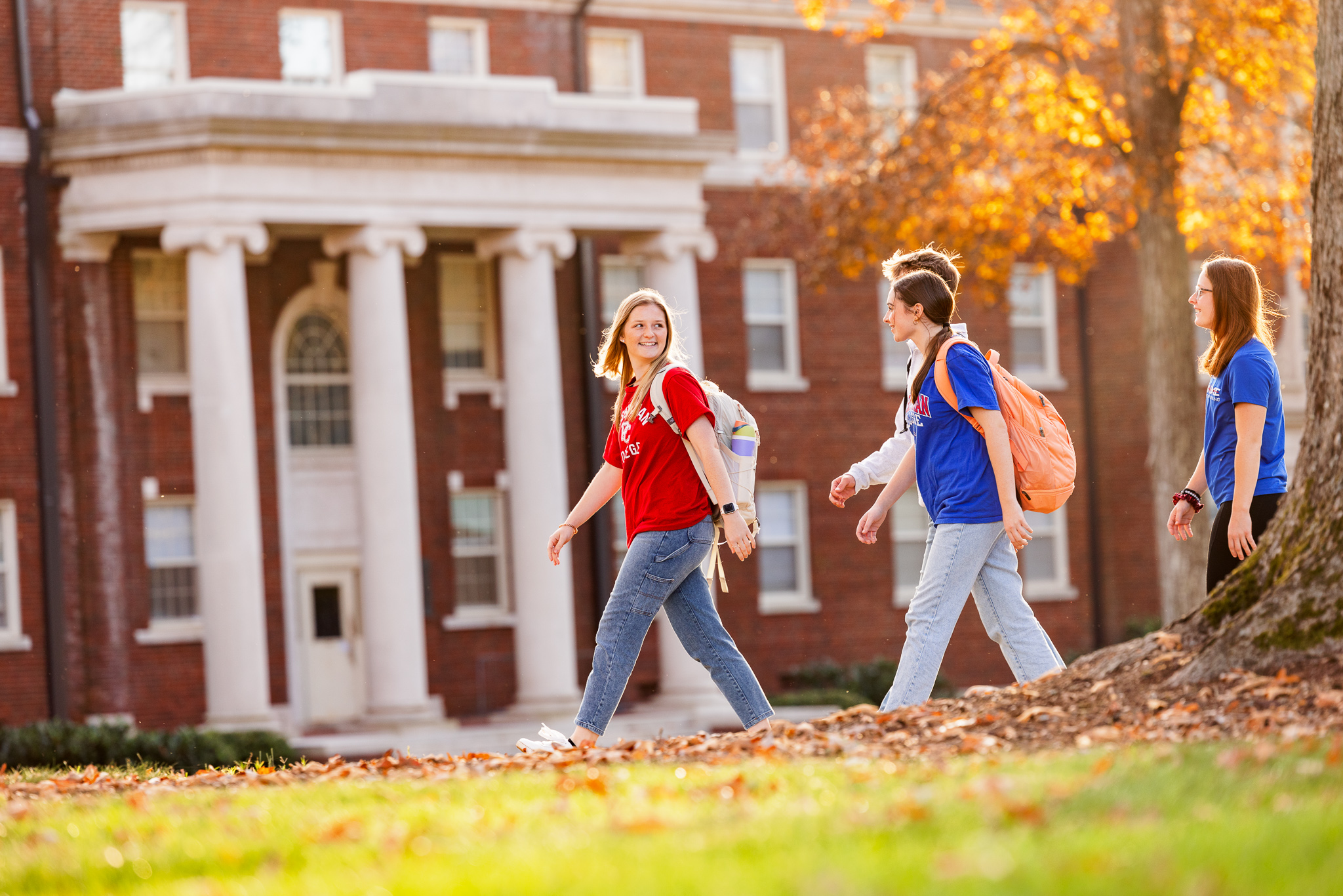 Presbyterian College students walking on campus.