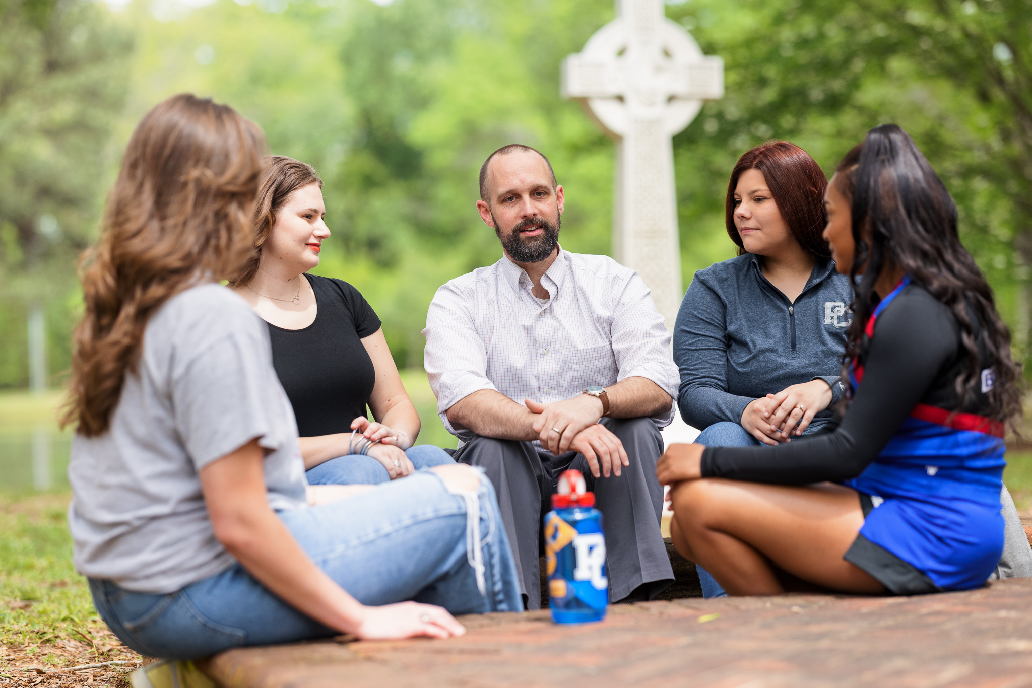 Rev. Dr. Buz Wilcoxcon with students.