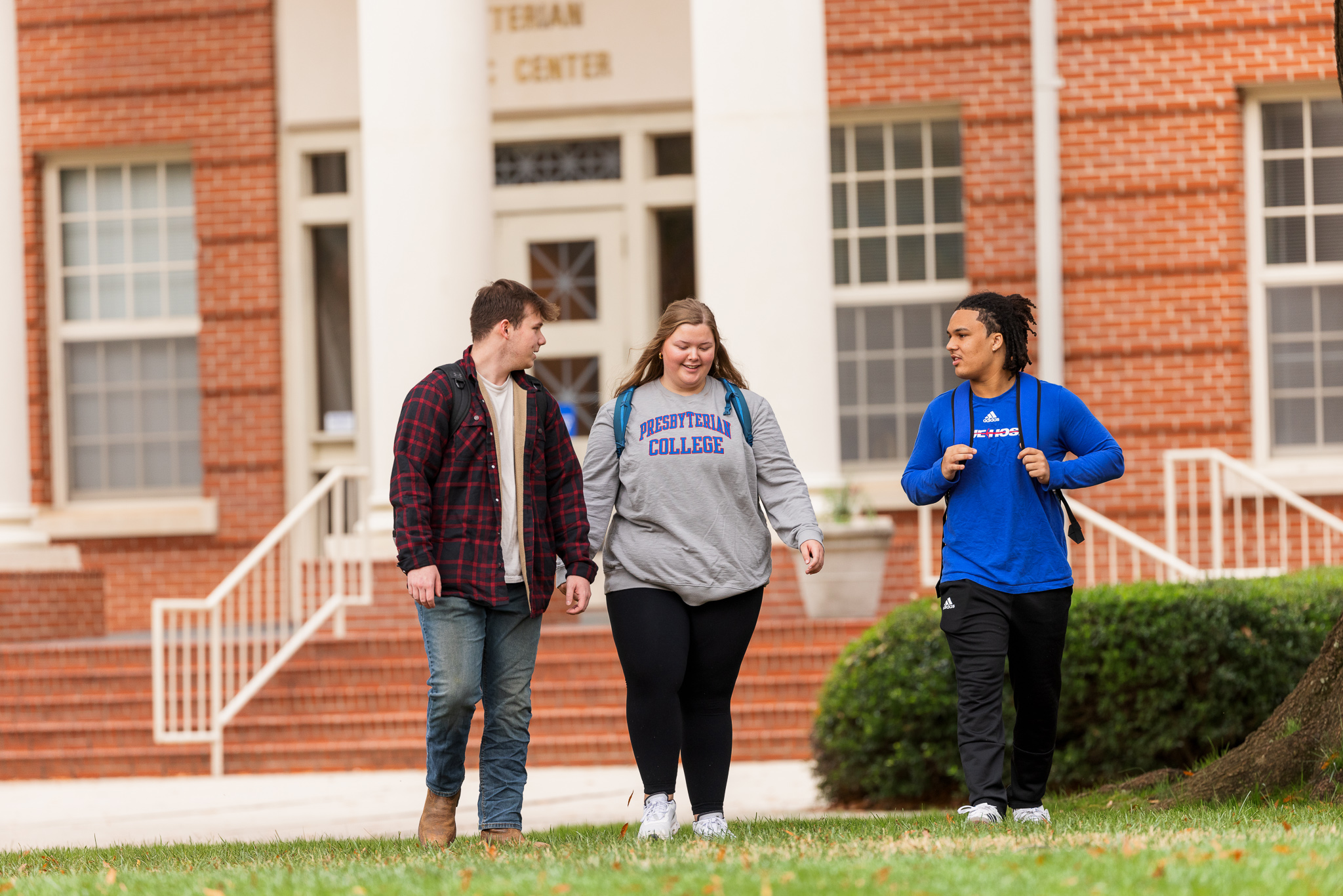 Presbyterian College students walking outside of Harrington Peachtree building.