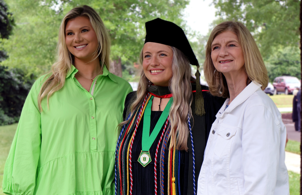 Dr. Audra Butler (center) is a 2025 graduate of the Presbyterian College School of Pharmacy.
