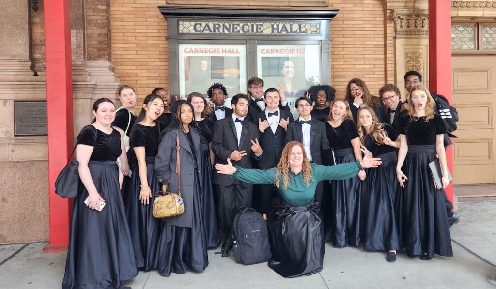 director of choral activities Kipper Ackerman, a 1997 graduate of Presbyterian College, led a group of PC students to Carnegie Hall, where she conducted a larger choir and symphony this summer.