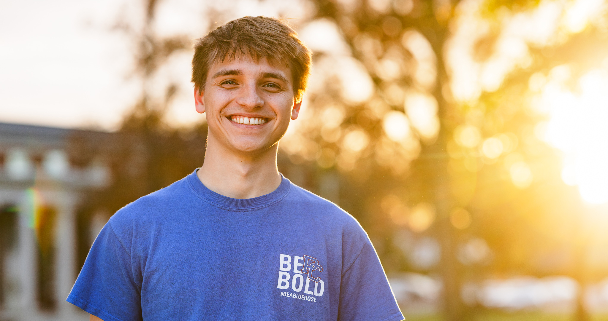 Student smiling at Presbyterian College.