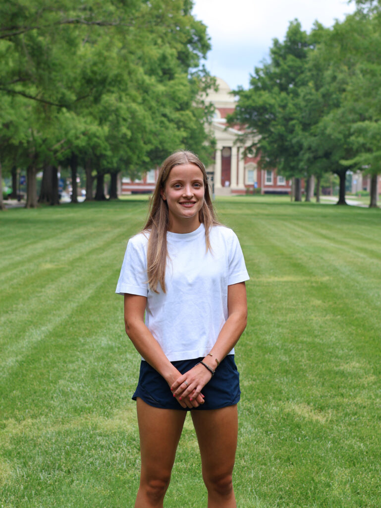 Presbyterian College student Emilia Lieber posing for a picture outside of Neville Hall. 