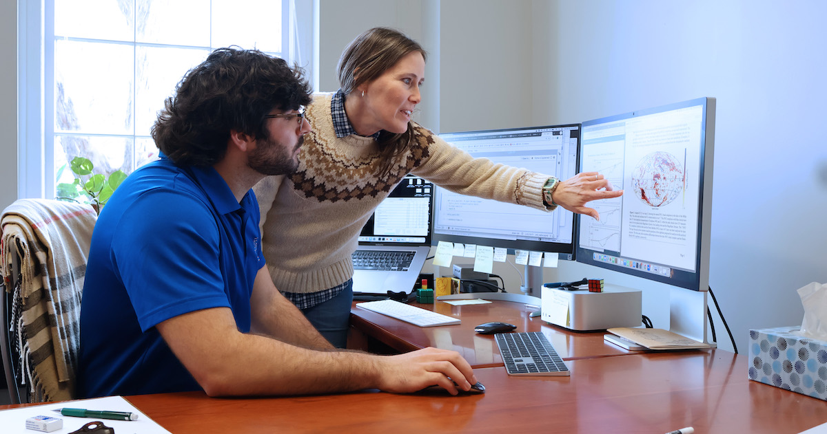 Assistant professor of physics Dr. Frances Cashman shows Presbyterian College sophomore Constantine Gandis images of the Milky Way Galaxy that are being used in her NASA-funded research.