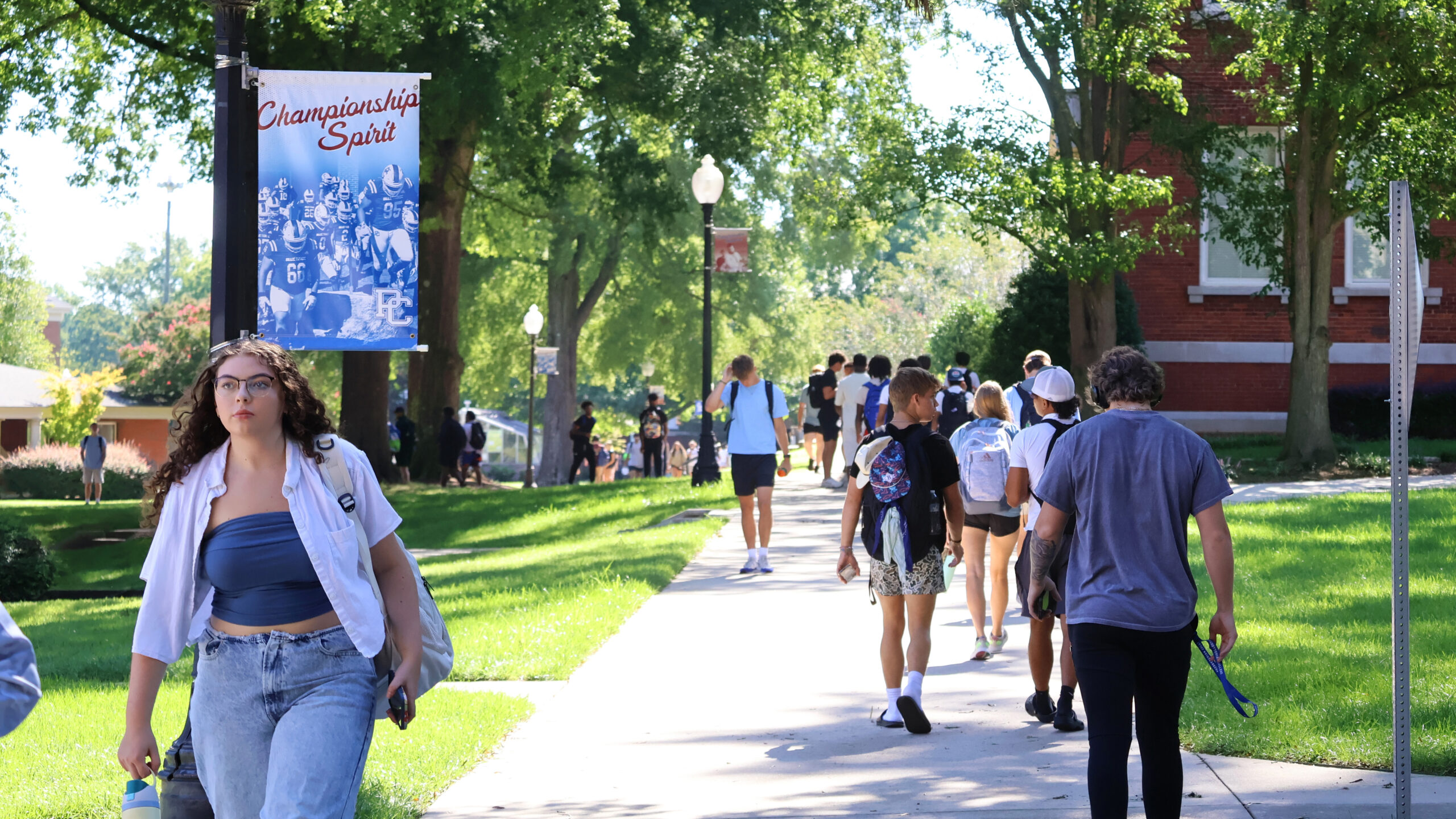 Presbyterian College students walking through campus on the way to classes.