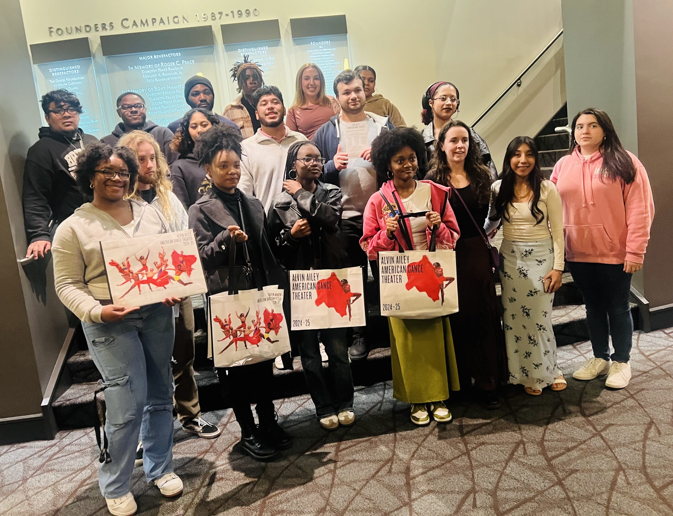 Presbyterian College students taking a group photo after an event.