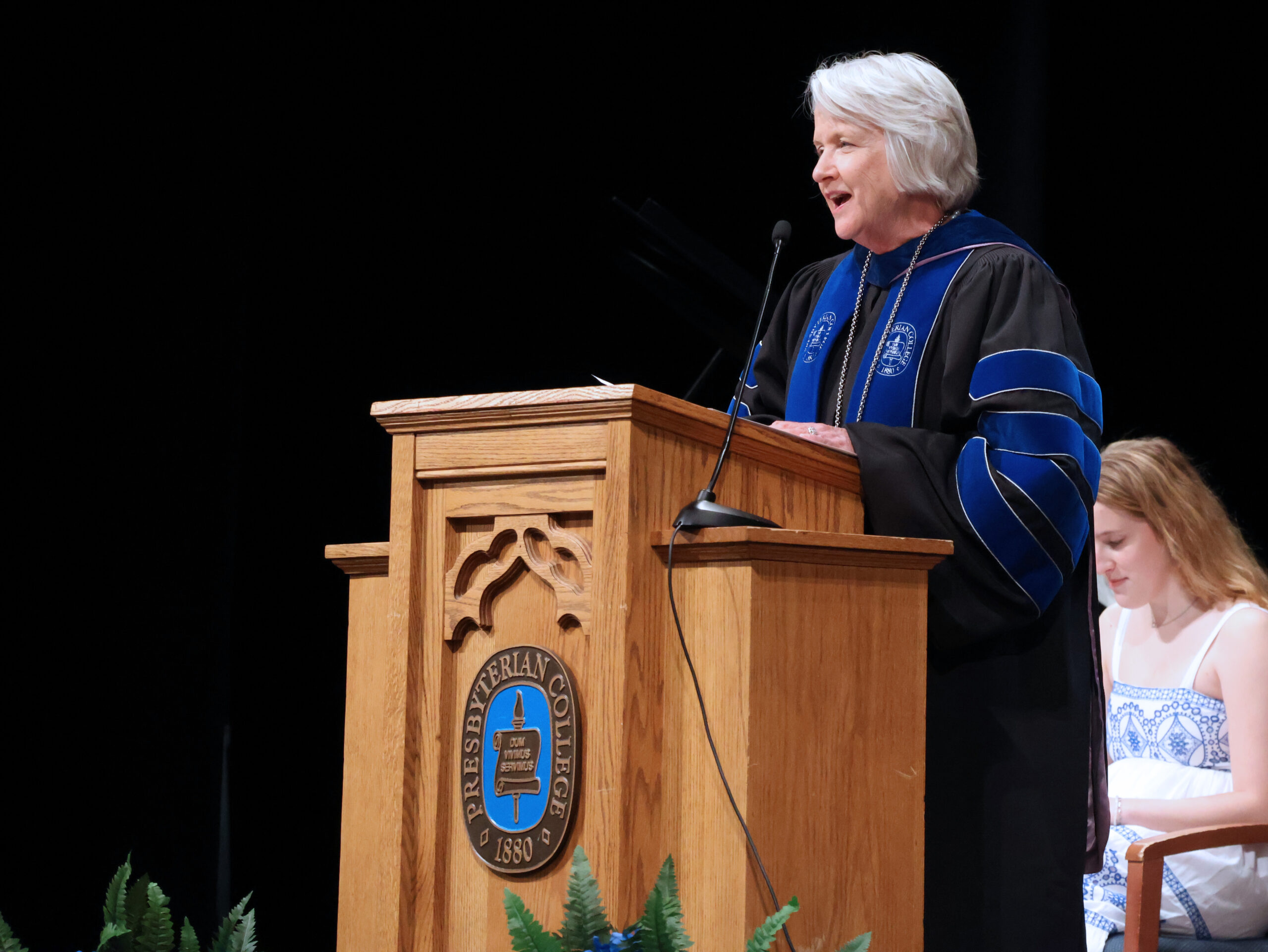 Dr. Anita Gustafson, President Presbyterian College speaking at an event.