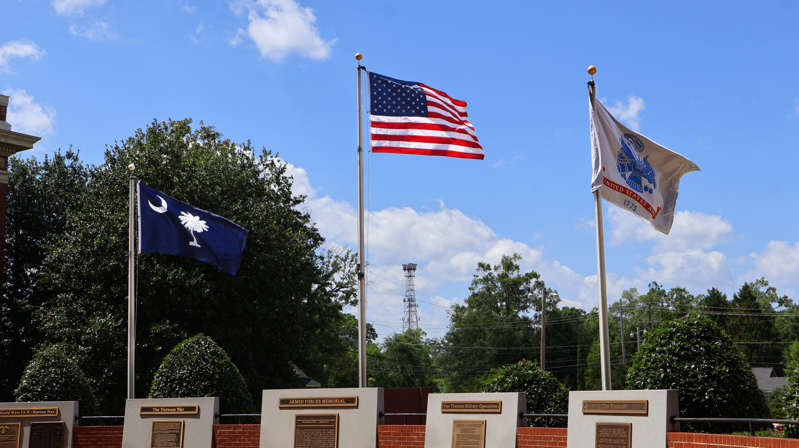 Picture of the United States flag, the South Caroline State flag, and the United States Army flag.