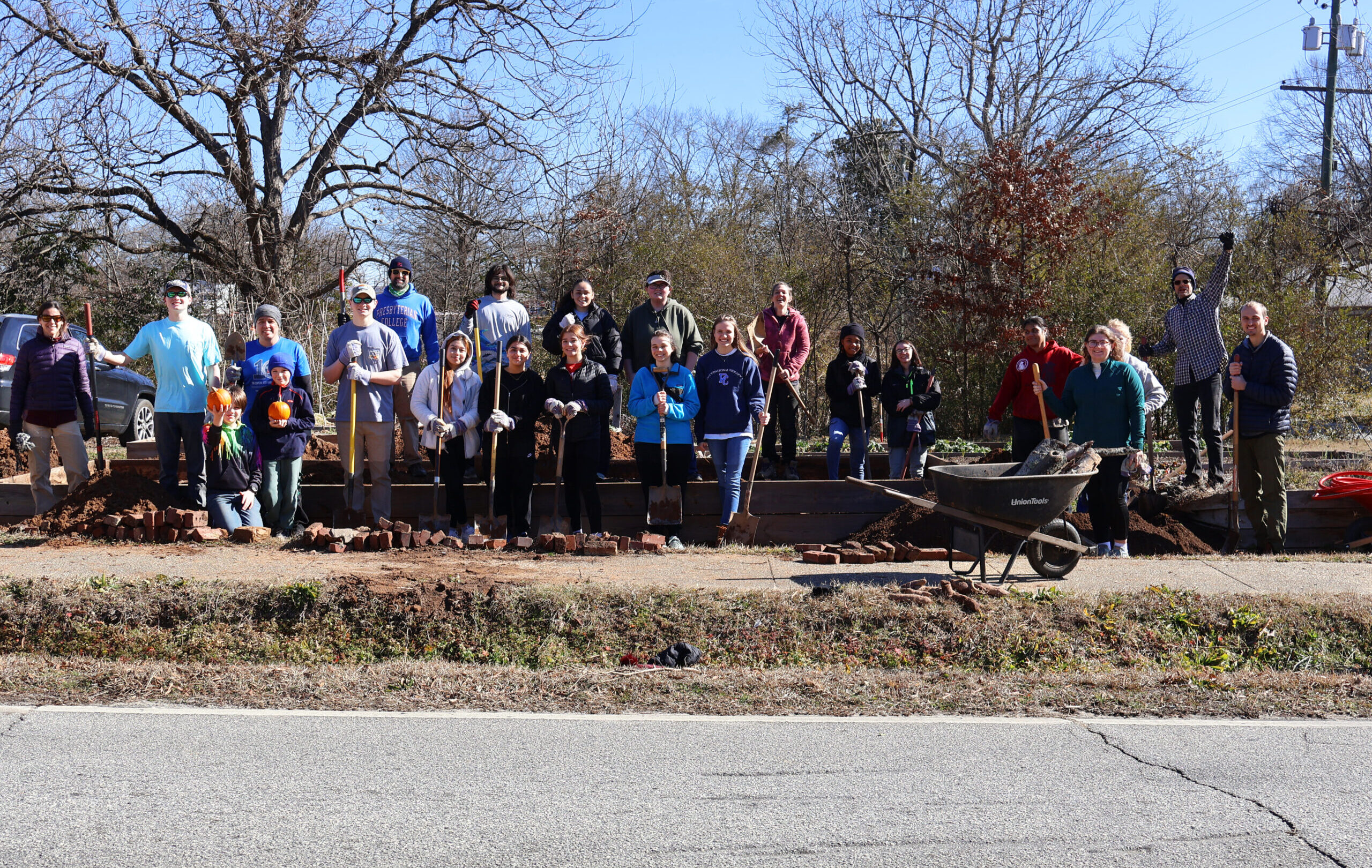 Presbyterian College students, faculty, and community members volunteering at the Community Garden.