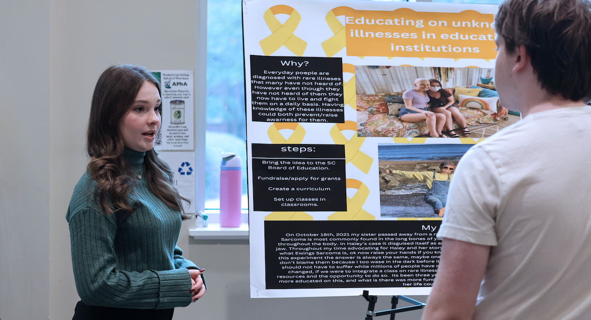Presbyterian College student Jade Hughes, a sophomore transfer student from Newberry, S.C., presents her project to educate people about rare diseases like the one that claimed her sister, Haley, a 2021 graduate of PC.