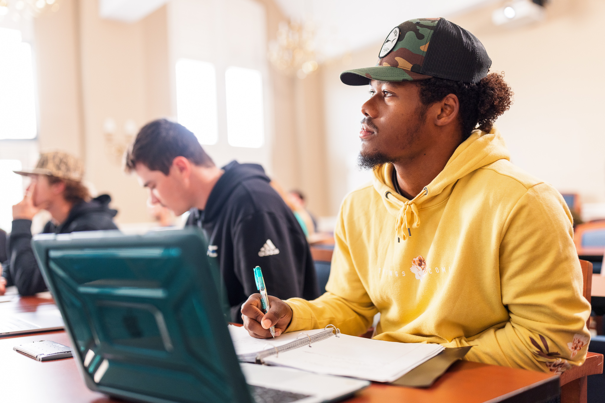 Presbyterian College student listening in class.