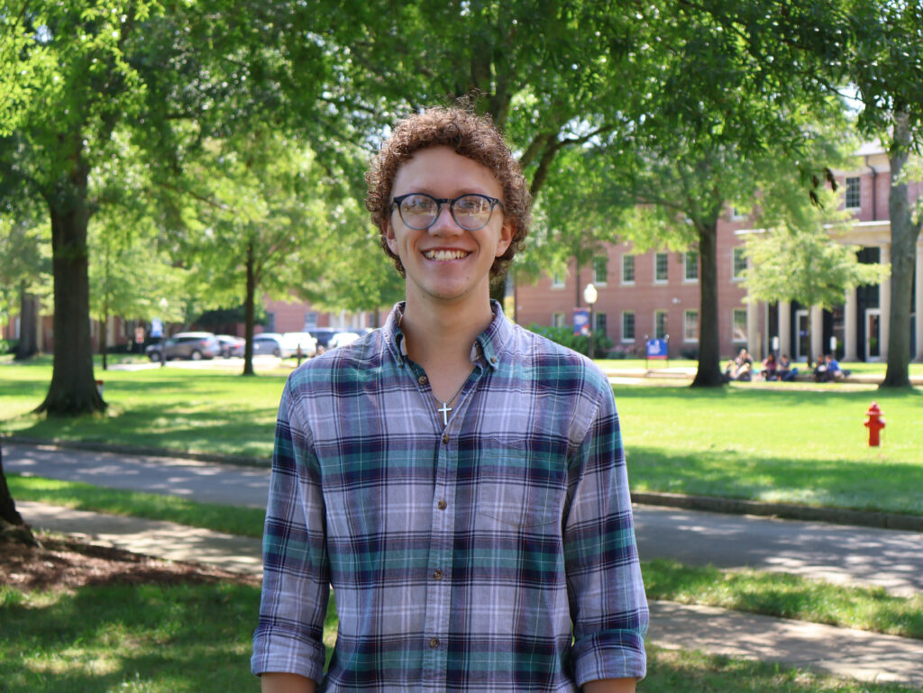 Presbyterian College student, Lyle Jones,  posing for a picture on campus.