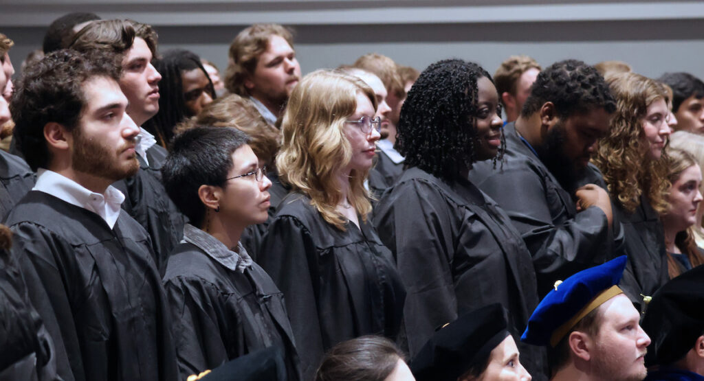 Members of Presbyterian College's senior class stand and are recognized at the college's 146th opening convocation.