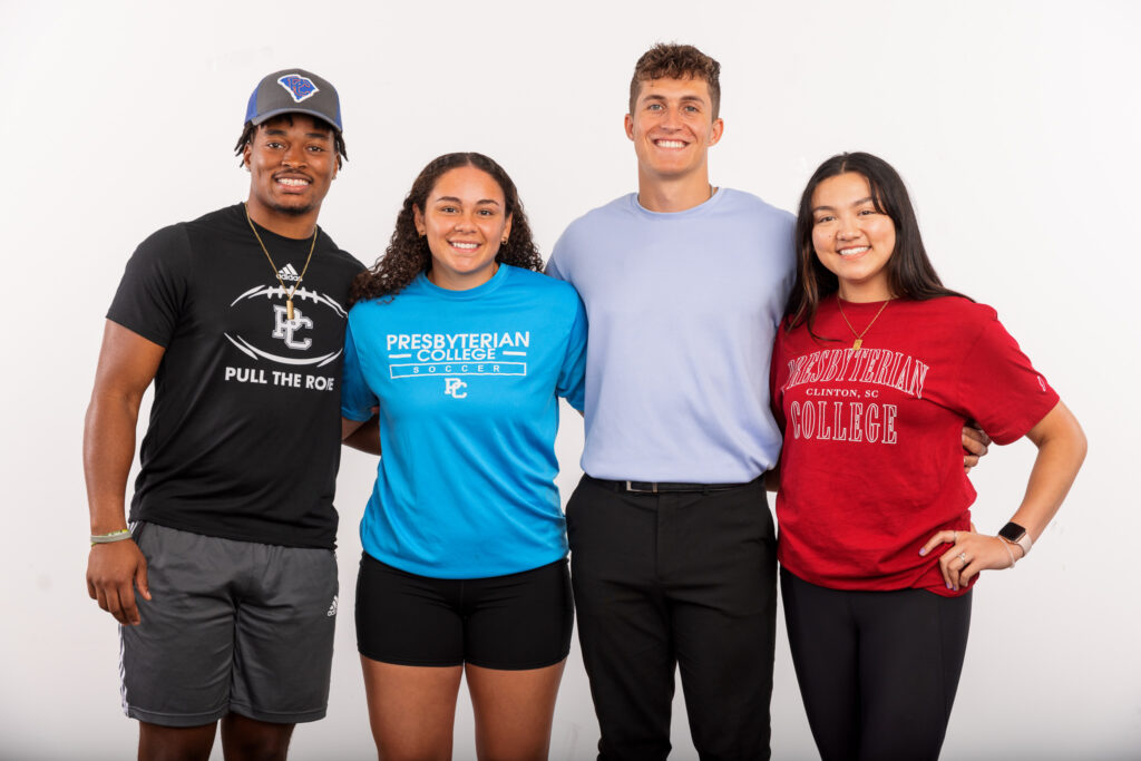 Presbyterian College student athletes posing for a photo. 