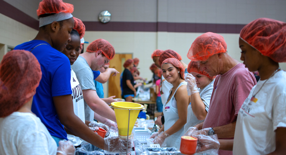Presbyterian College's first-year students volunteer at First Presbyterian Church in Clinton for the Rise Against Hunger event.