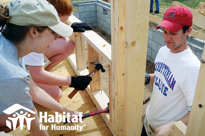 PC students working a Habitat for Humanity project. 