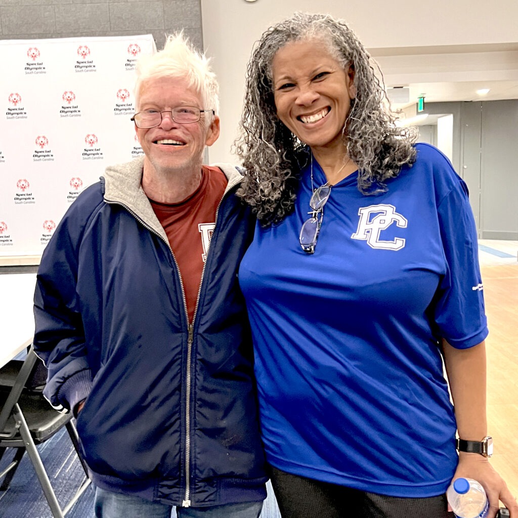 Rev. Dr. British Hyrams with a Unified Sports player. 